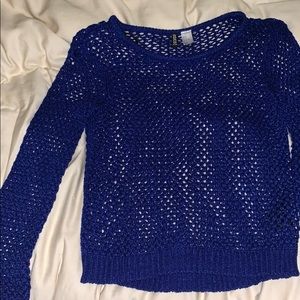 Holed blue sweater